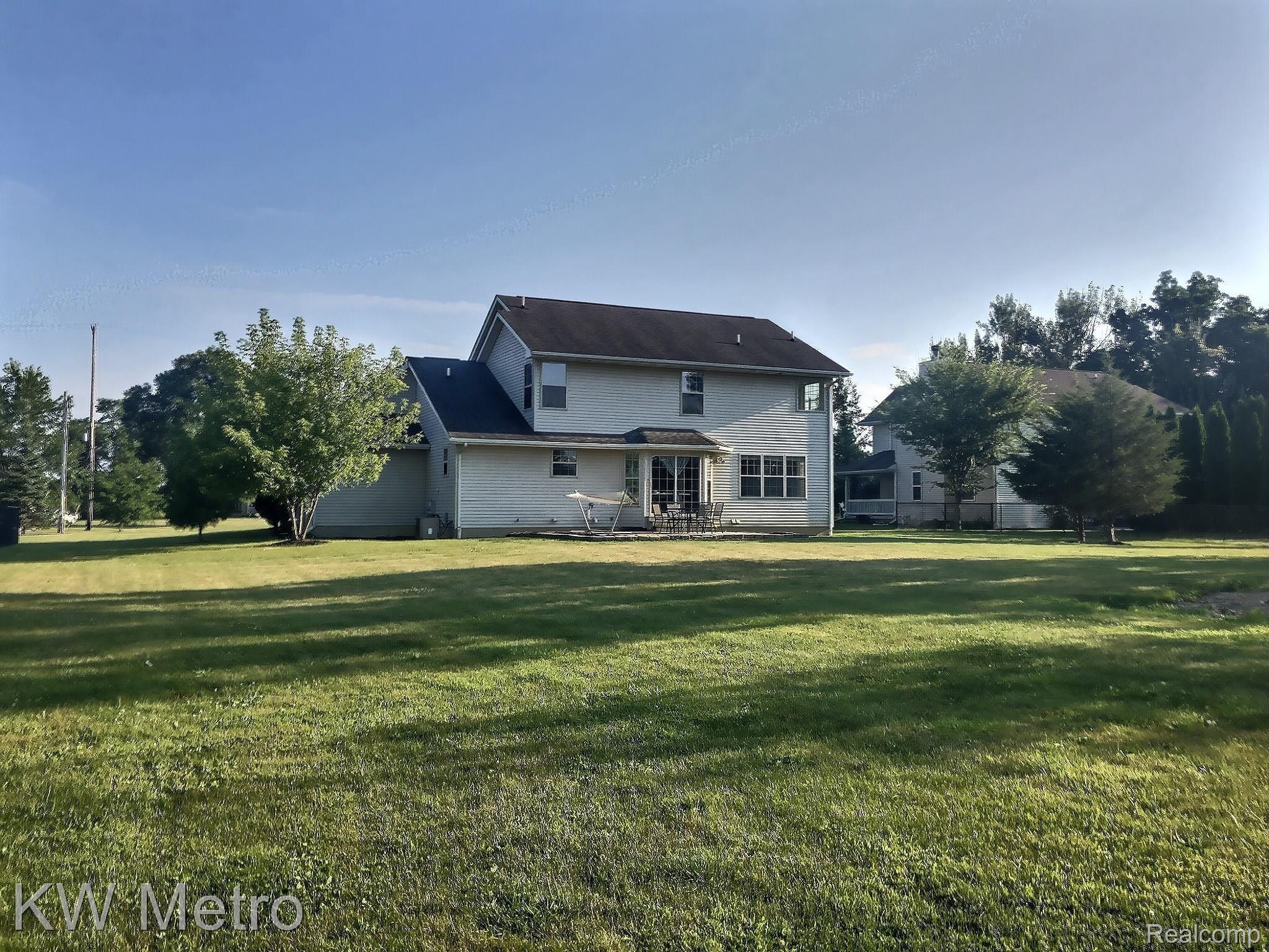 1421 Reid Road Grand Blanc, MI 48439 - Photo 24 of 32 Backyard View