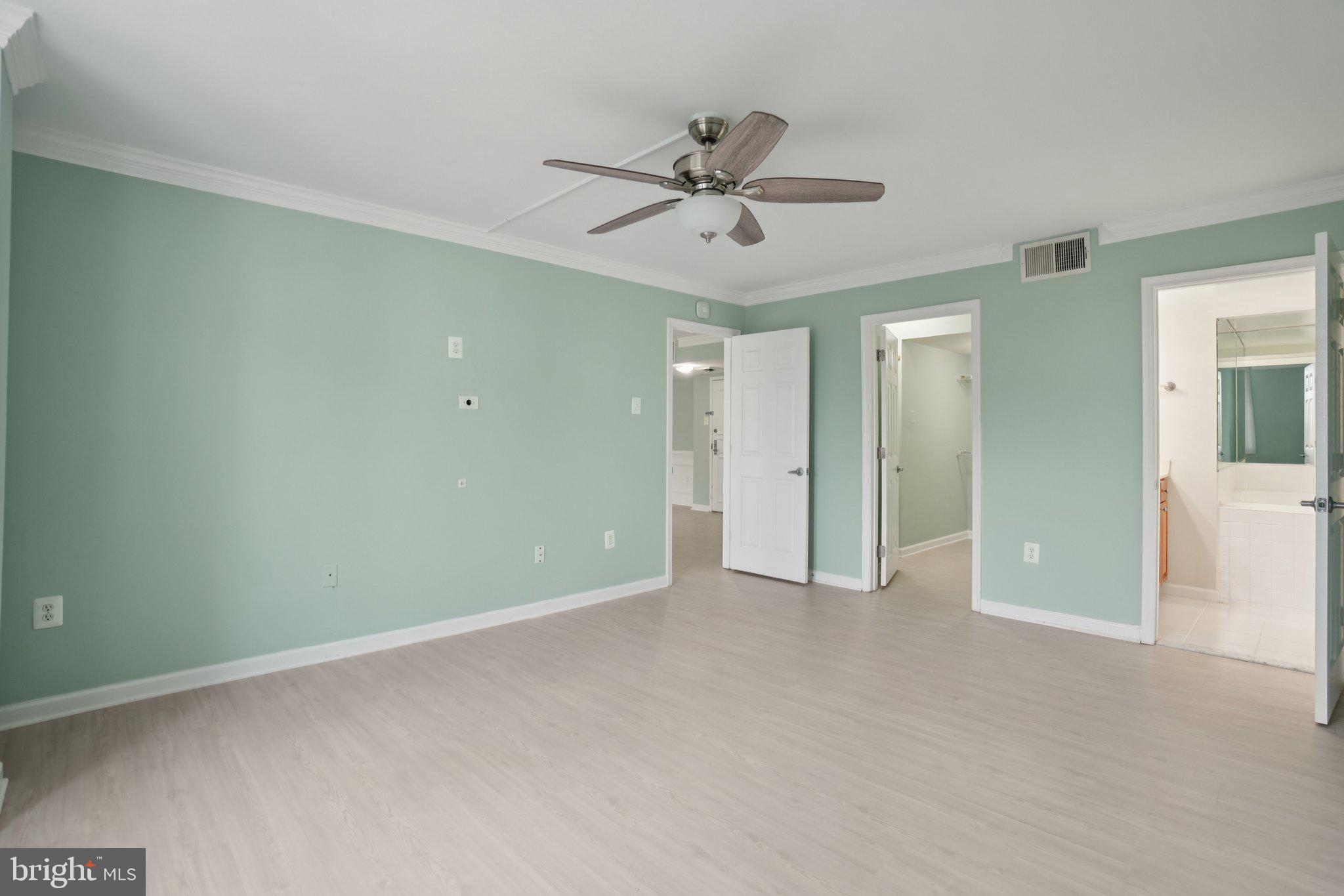 1515 South Arlington Ridge Road, Unit 603 Arlington, VA 22202 - Photo 12 of 39 a view of an empty room and a ceiling fan