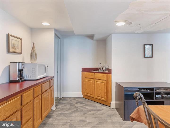 1515 South Arlington Ridge Road, Unit 603 Arlington, VA 22202 - Photo 32 of 39 a kitchen with stainless steel appliances granite countertop a stove a sink and a refrigerator