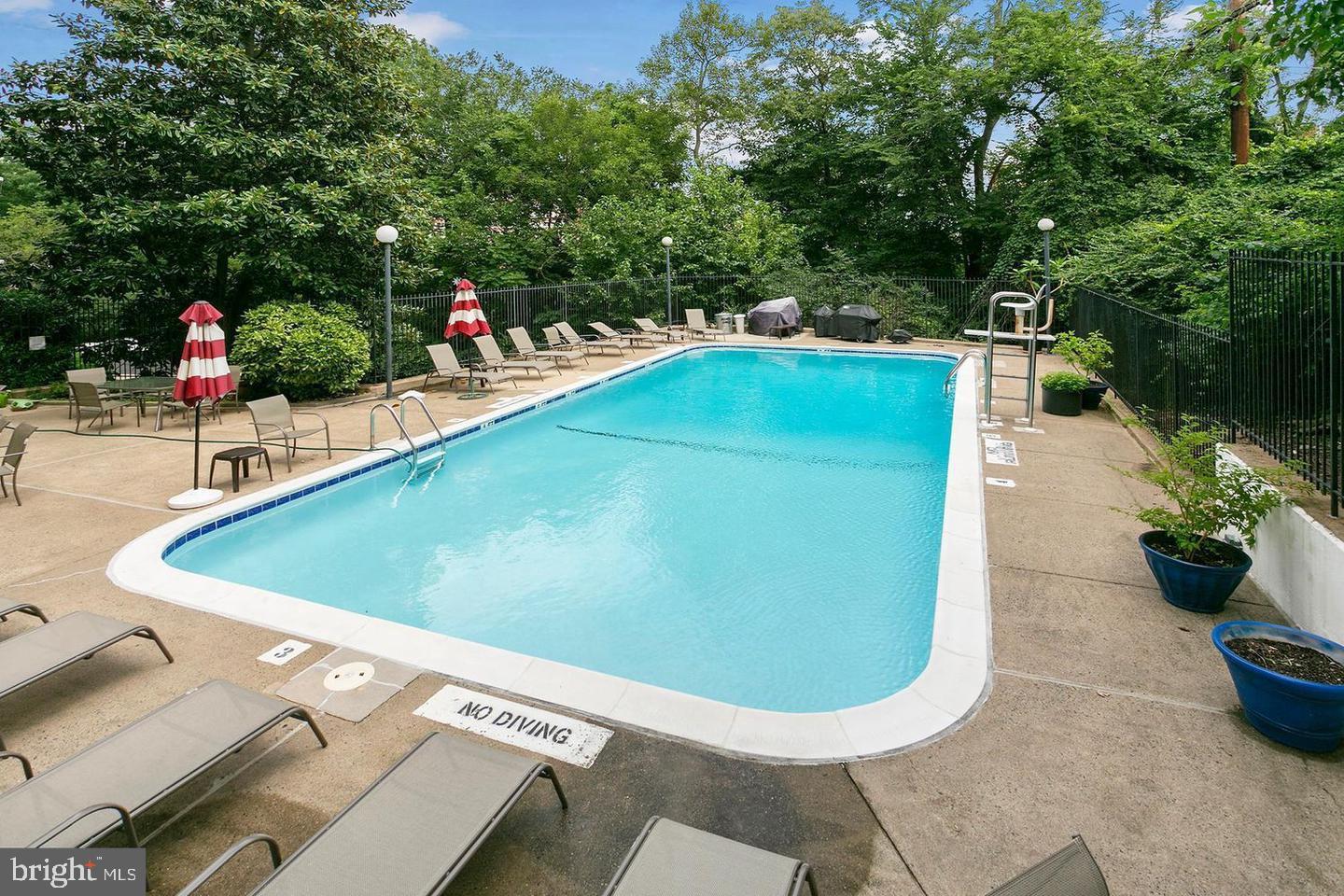 1515 South Arlington Ridge Road, Unit 603 Arlington, VA 22202 - Photo 35 of 39 swimming pool view with a garden space