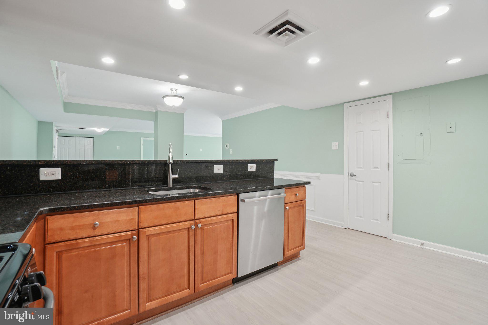 1515 South Arlington Ridge Road, Unit 603 Arlington, VA 22202 - Photo 9 of 39 a bathroom with double vanity and a mirror