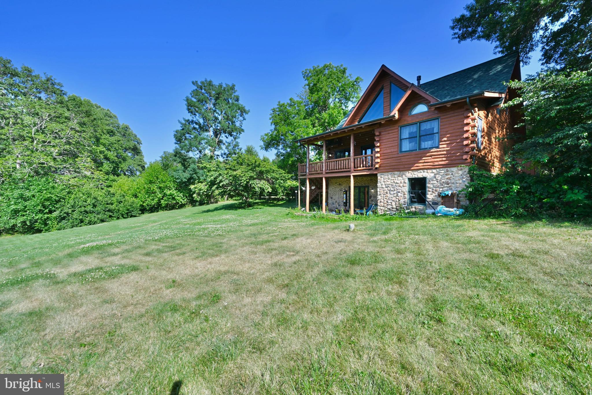 8051 Old Receiver Road Frederick, MD 21702 - Photo 44 of 54 View of the rear of home and a huge back yard