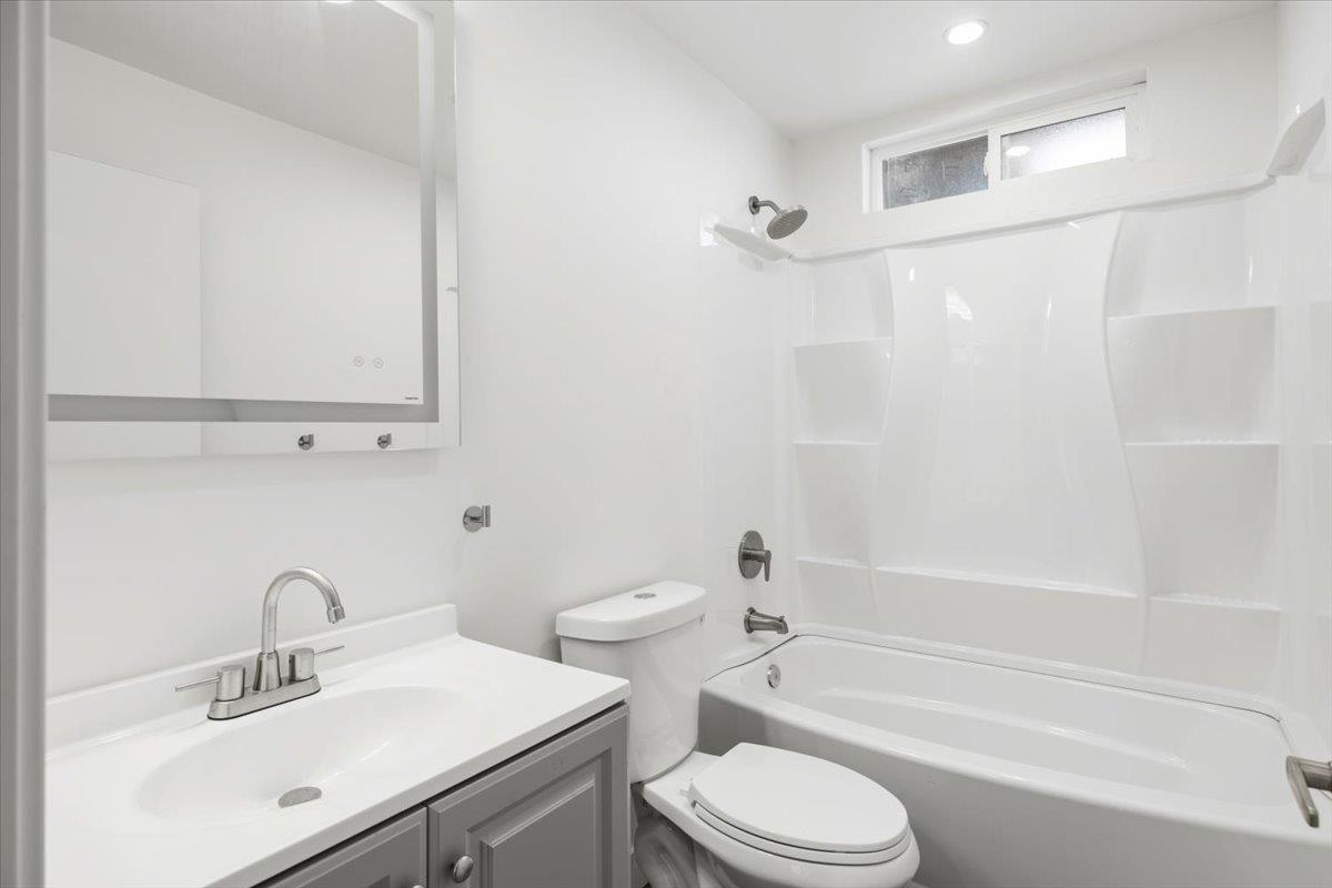 209 Dewitt Court Sacramento, CA 95838 - Photo 24 of 25 full bath with vanity and shower / bath combination
