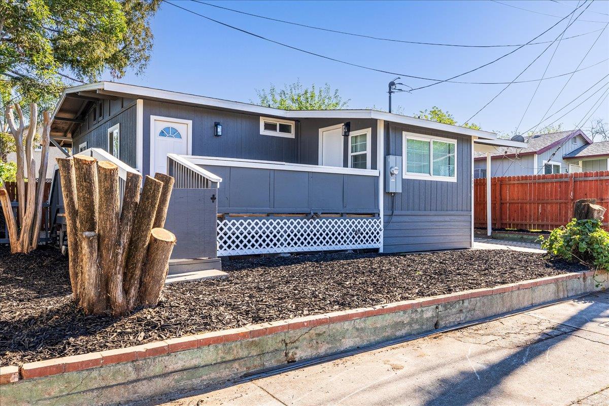 209 Dewitt Court Sacramento, CA 95838 - Photo 3 of 25 view of front of home featuring a wooden deck