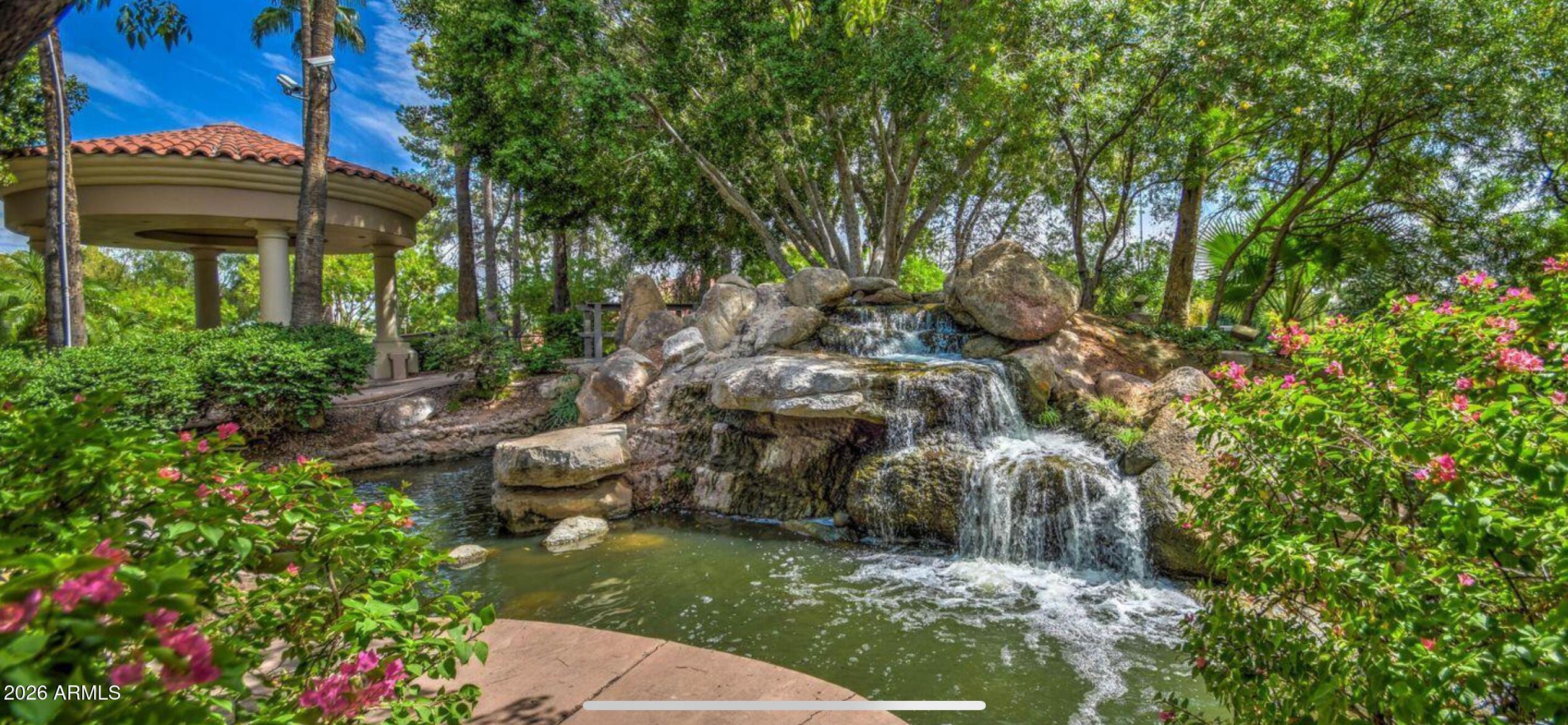 2301 East Santa Rosa Drive Gilbert, AZ 85234 - Photo 53 of 54 waterfall and pool