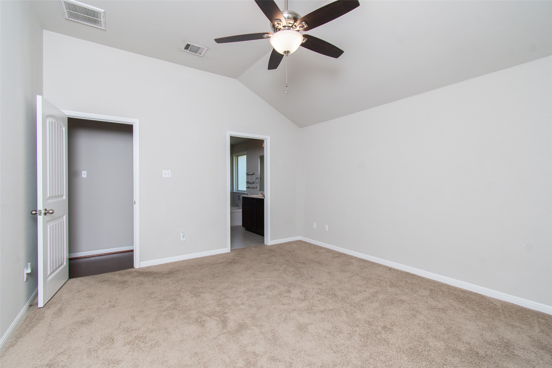 136 Mistflower Lane Kyle, TX 78640 - Photo 11 of 20 wooden floor in an empty room