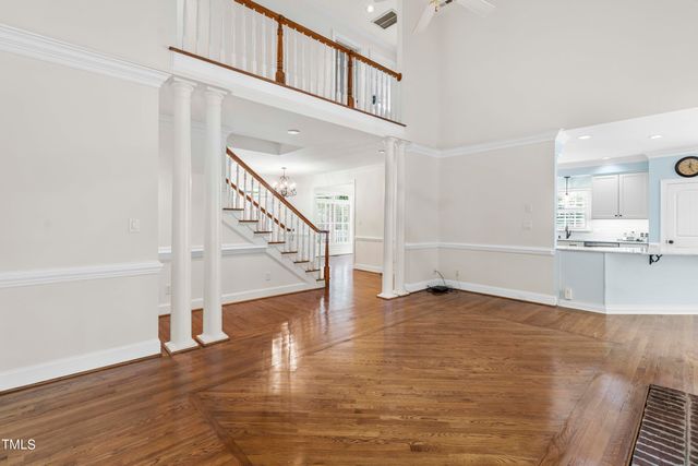 a view of a hallway with staircase