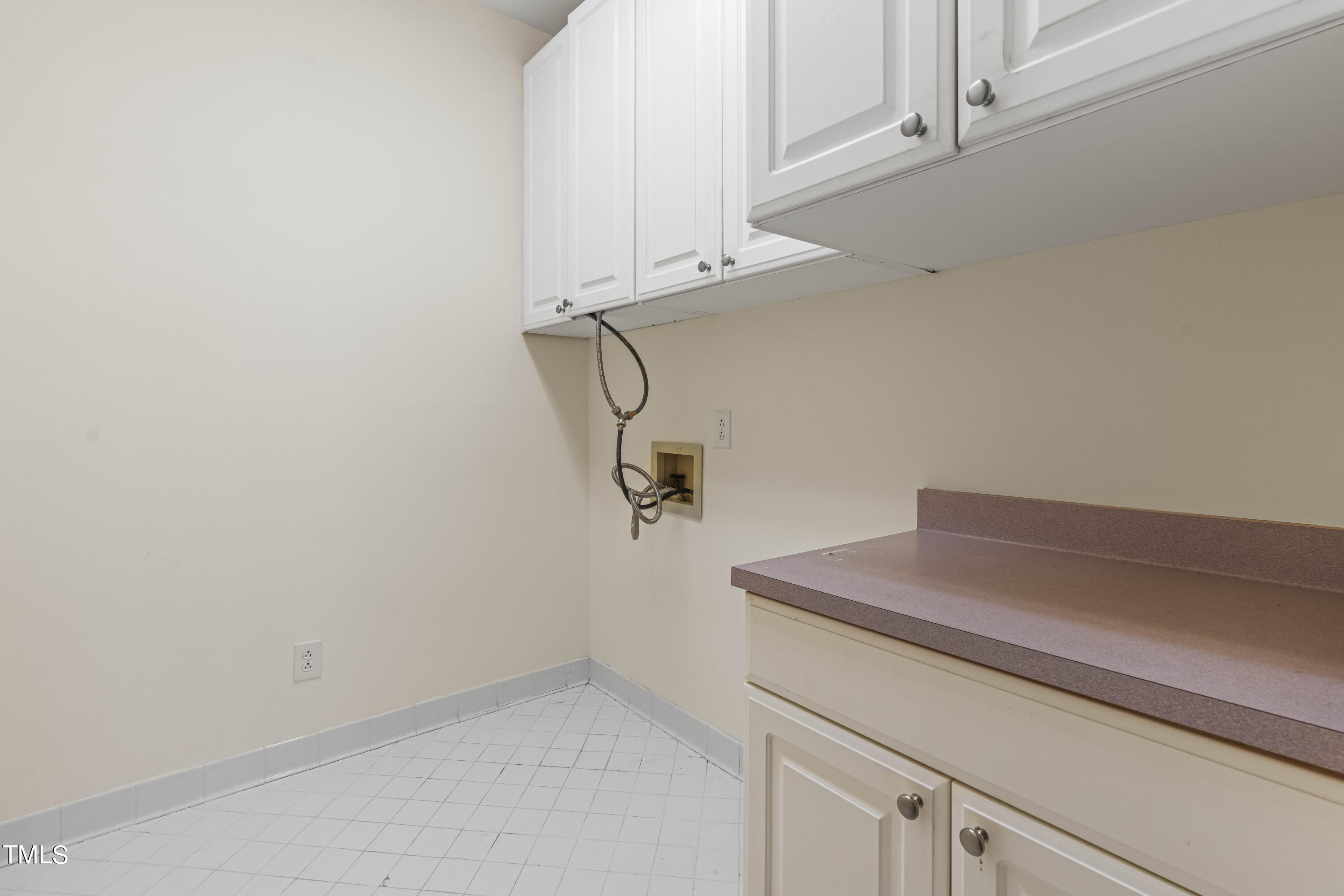 1556 Crenshaw Point Wake Forest, NC 27587 - Photo 28 of 46 a view of a room with racks on the wall