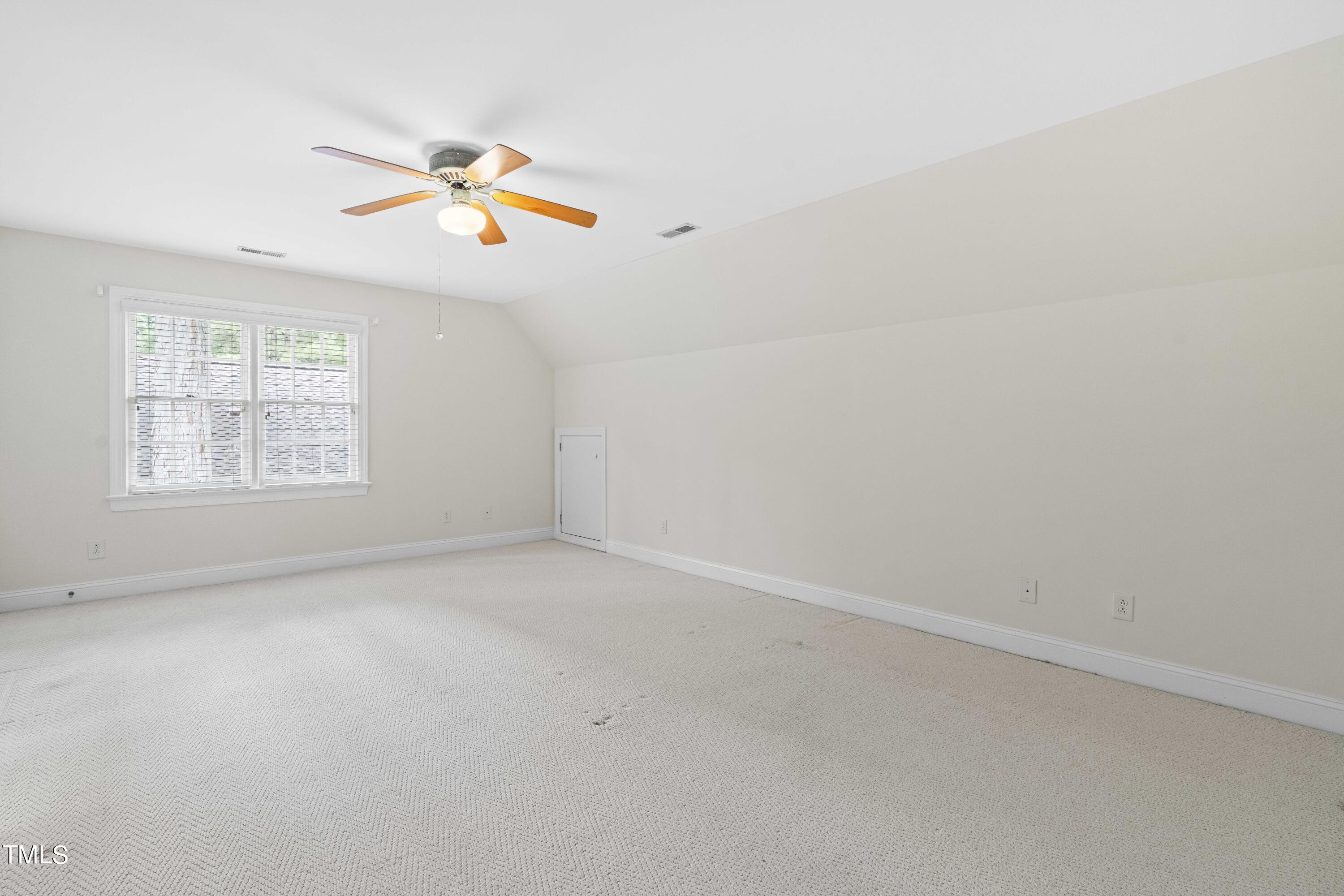 1556 Crenshaw Point Wake Forest, NC 27587 - Photo 29 of 46 an empty room with windows