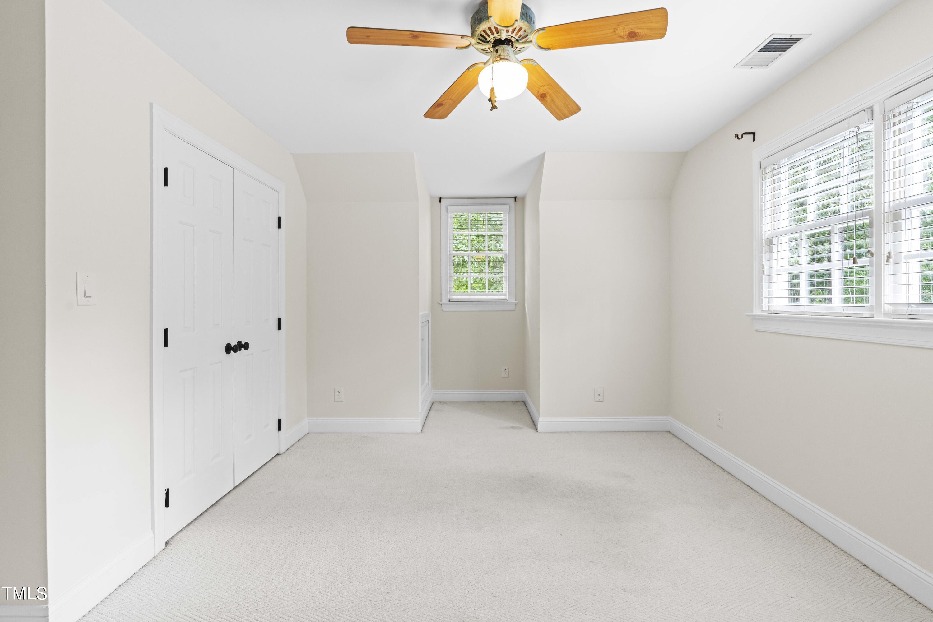 1556 Crenshaw Point Wake Forest, NC 27587 - Photo 34 of 46 wooden floor in an empty room with a window