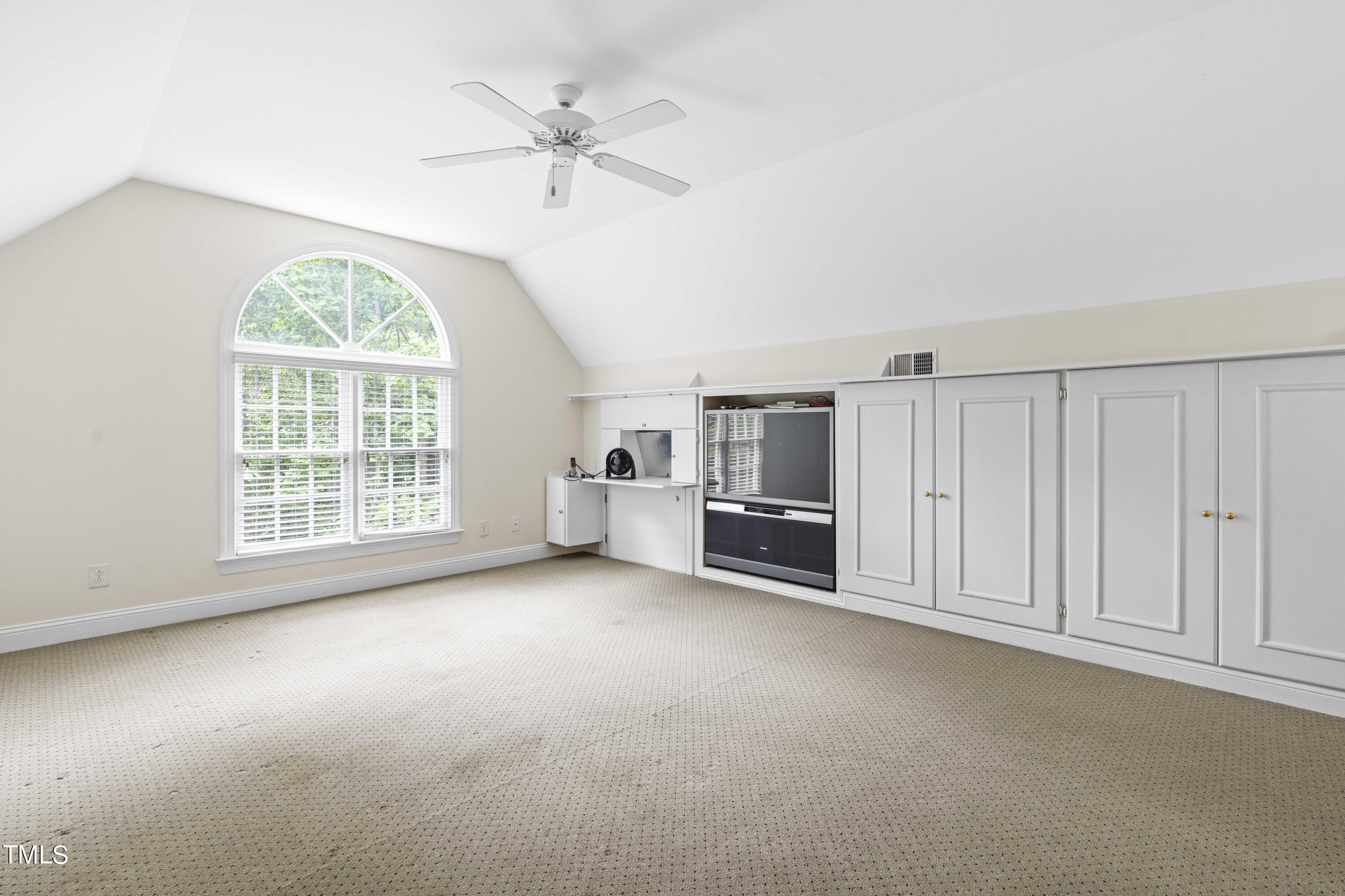 1556 Crenshaw Point Wake Forest, NC 27587 - Photo 37 of 46 an empty room with furniture and a window