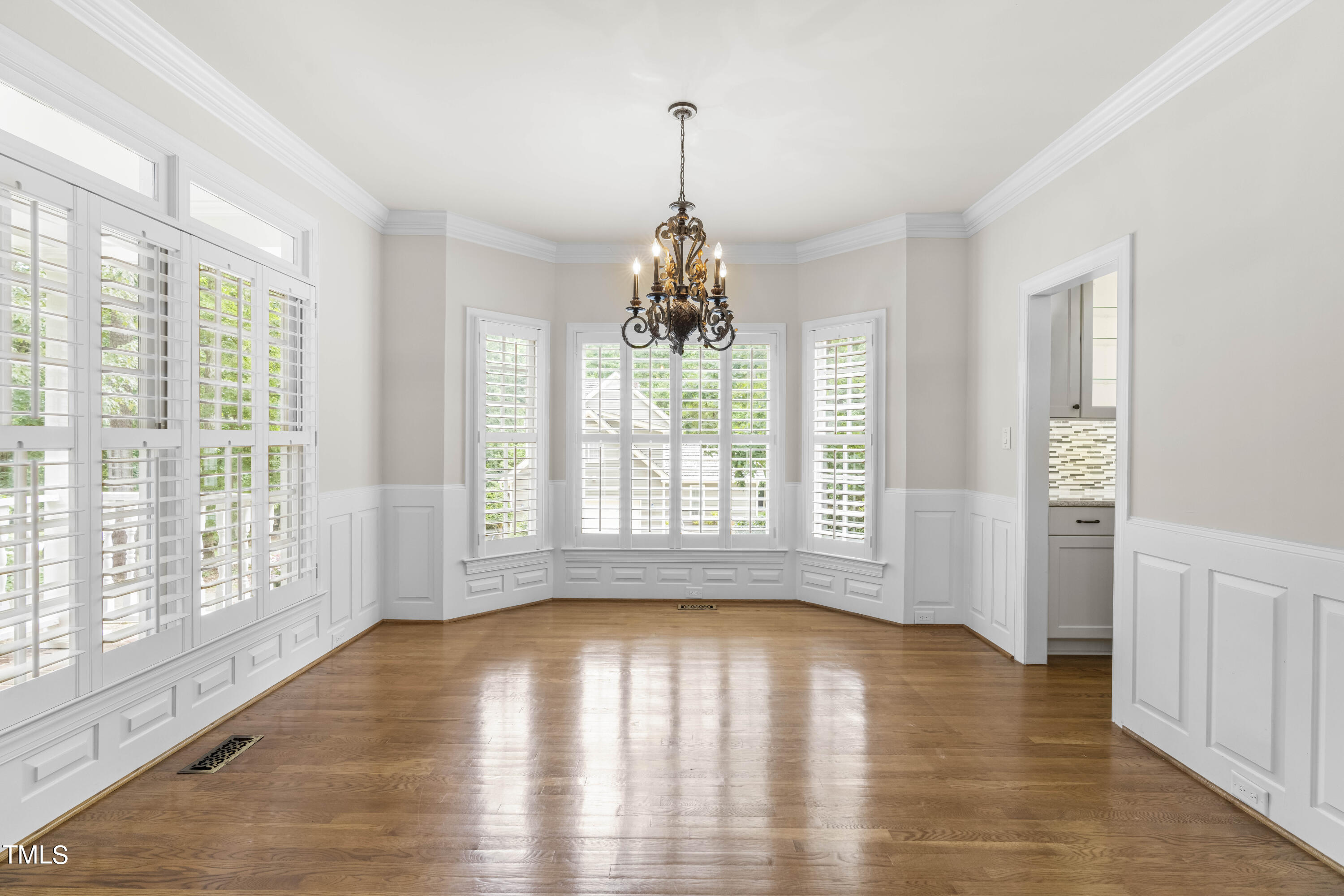 1556 Crenshaw Point Wake Forest, NC 27587 - Photo 7 of 46 a view of empty room with wooden floor and fan