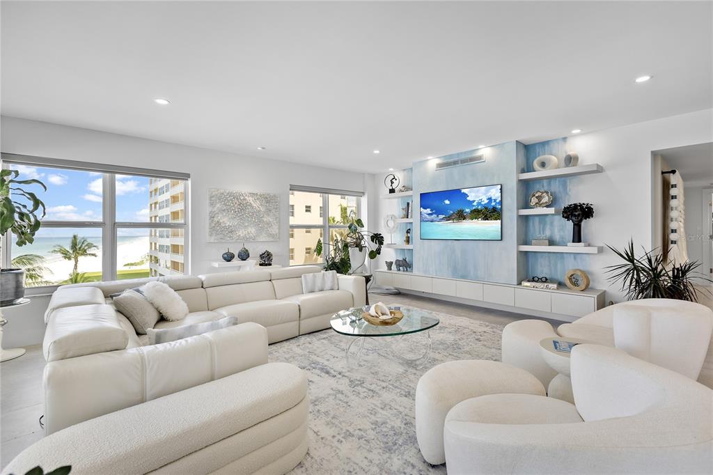 601 Longboat Club Road, Unit 404S Longboat Key, FL 34228 - Photo 2 of 28 a living room with furniture and a large window