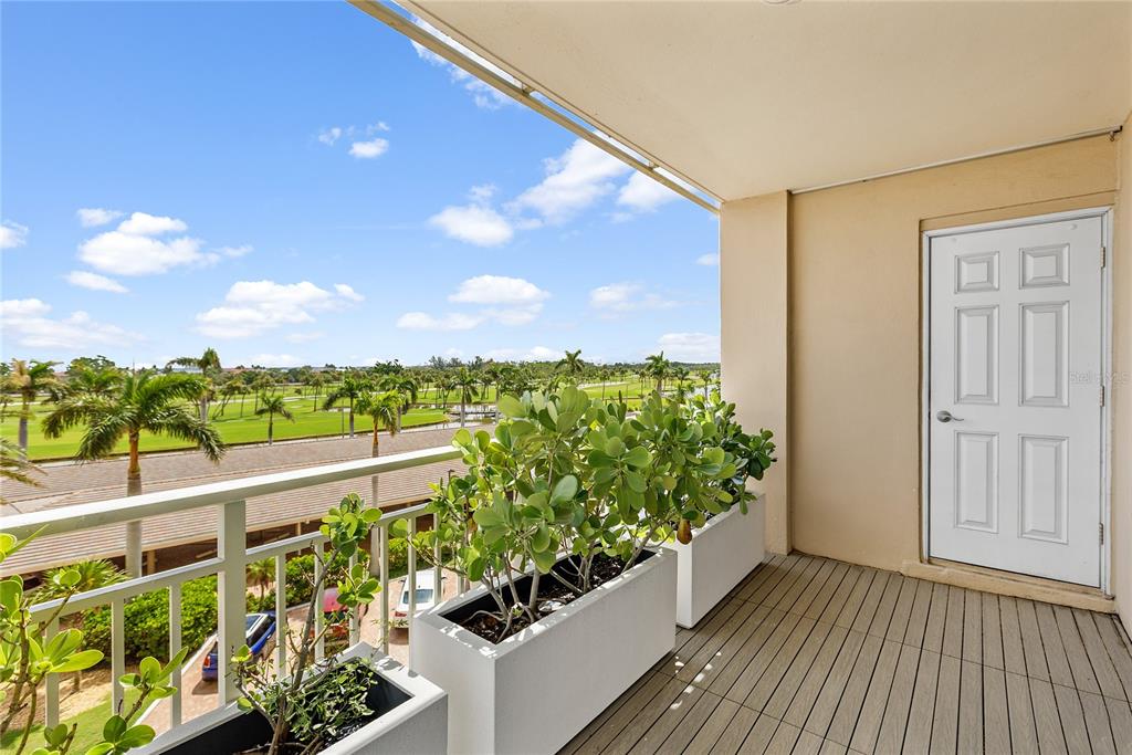 601 Longboat Club Road, Unit 404S Longboat Key, FL 34228 - Photo 22 of 28 a view of a garden