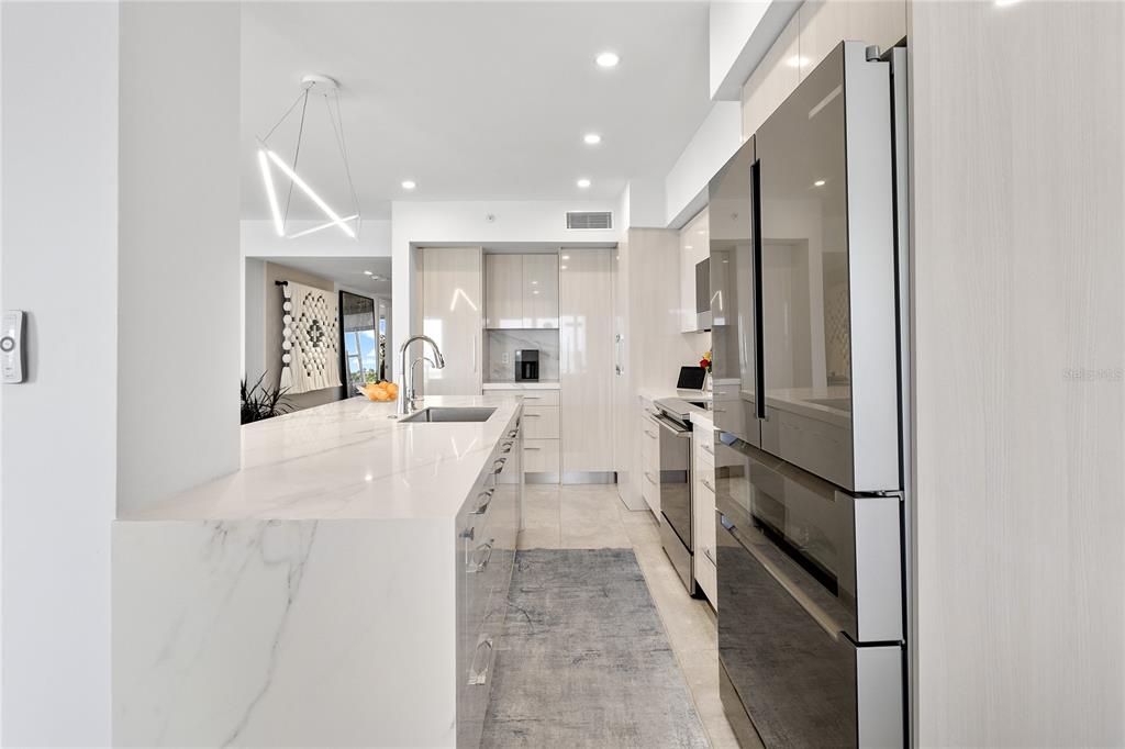 601 Longboat Club Road, Unit 404S Longboat Key, FL 34228 - Photo 9 of 28 a bathroom with a sink and mirror