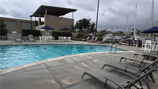 a view of a swimming pool with a patio