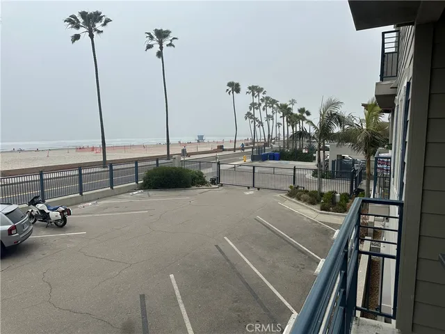 a view of a balcony with chairs