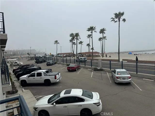 a couple of cars parked in a parking lot