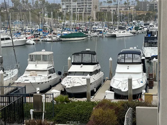 a balcony with chairs and table