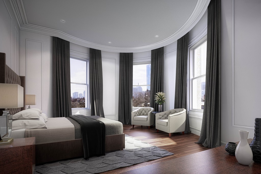 448 Beacon Street, Unit 5 Boston, MA 02115 - Photo 3 of 12 a bedroom with a bed and wooden floor