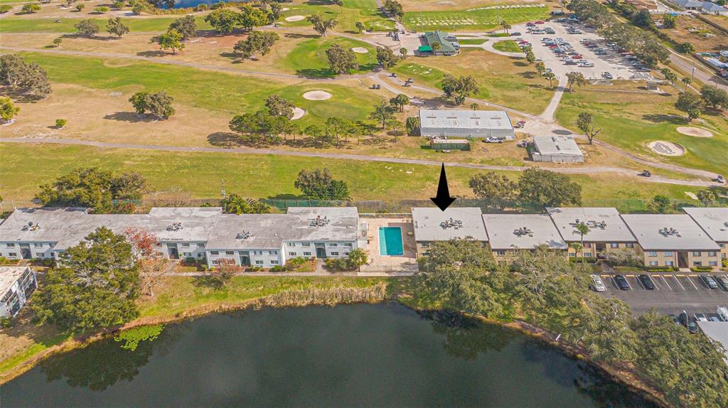 629 North Keene Road, Unit T11 Clearwater, FL 33755 - Photo 16 of 16 an aerial view of residential houses with outdoor space