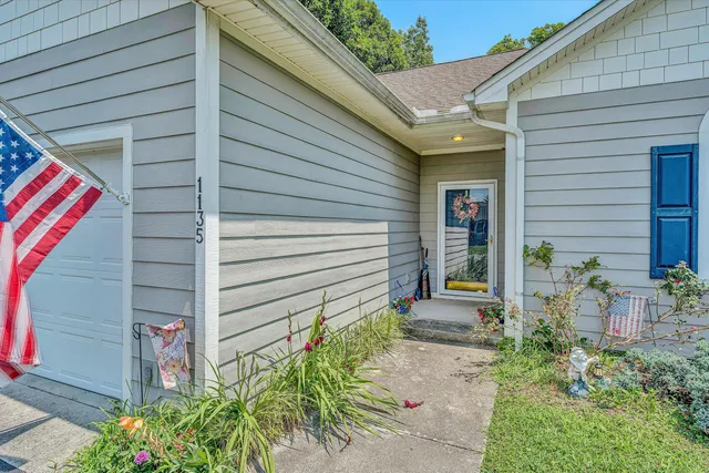 a backyard of a house with seating space