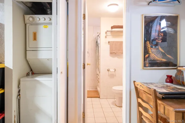 a view of bathroom with a sink dryer and washer