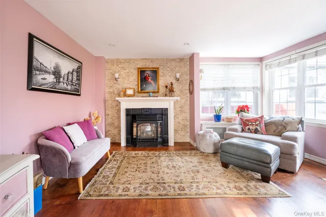 a living room with furniture or couch and a fireplace