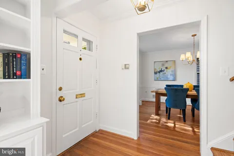 a kitchen with granite countertop cabinets stainless steel appliances and a window