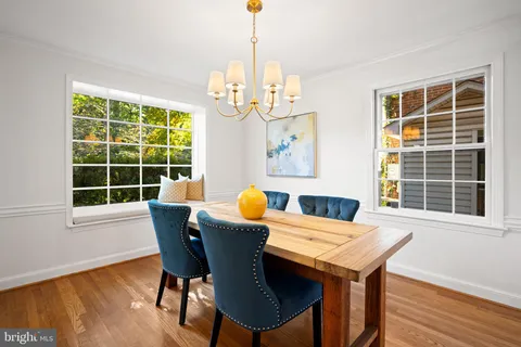 a kitchen with stainless steel appliances kitchen island granite countertop a sink and cabinets