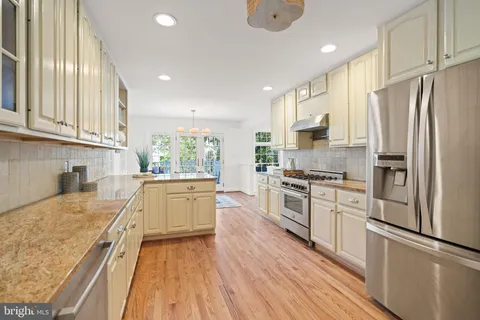 a living room with furniture and windows