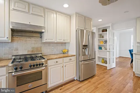 a view of a chairs in wooden deck