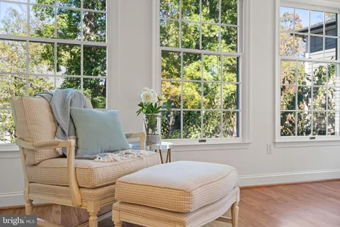 a view of room with wooden floor