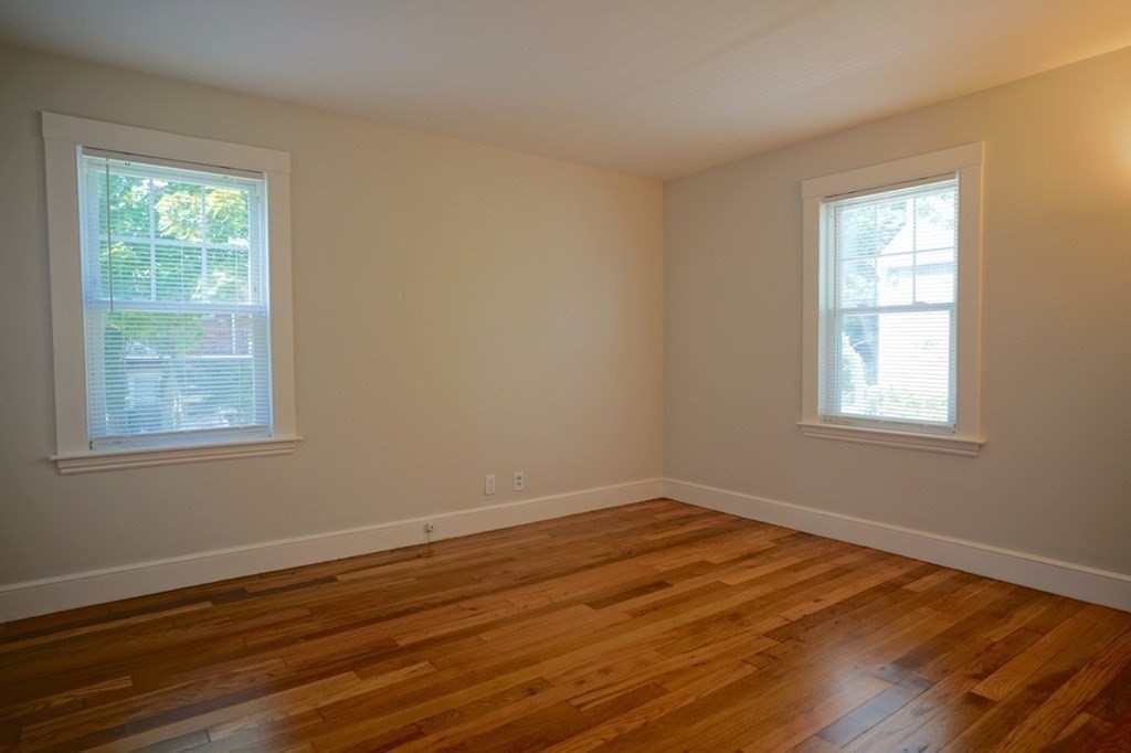 24 Peach Highlands Marblehead, MA 01945 - Photo 17 of 42 a view of a room with wooden floor and windows in it