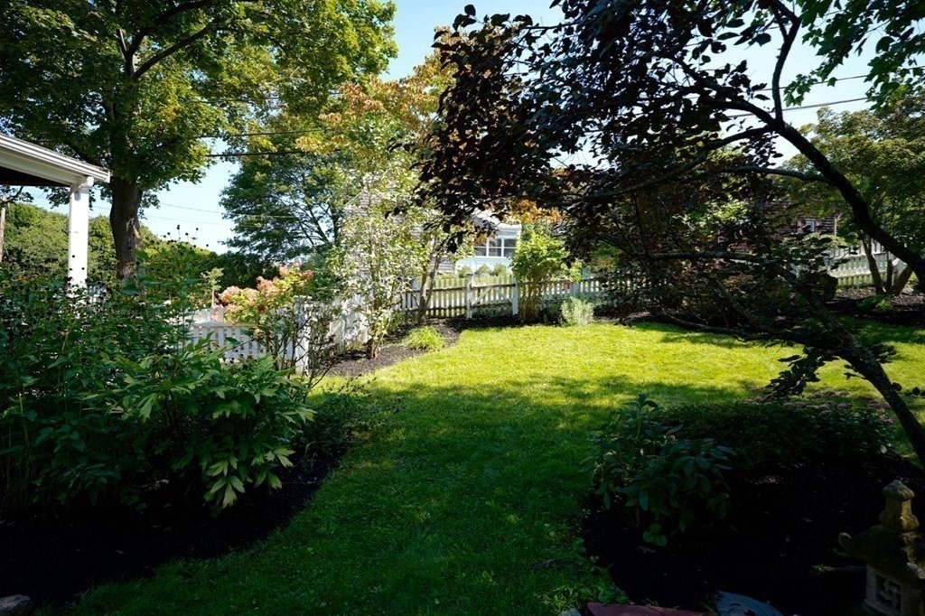 24 Peach Highlands Marblehead, MA 01945 - Photo 30 of 42 a view of yard with swimming pool and green space