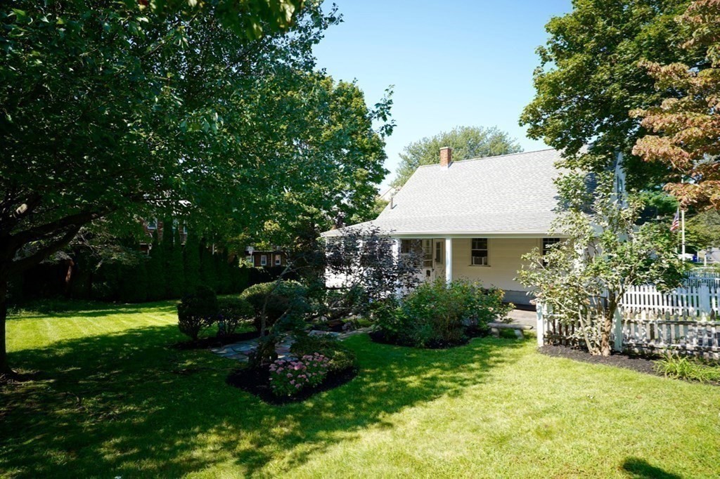 24 Peach Highlands Marblehead, MA 01945 - Photo 31 of 42 a view of a house with swimming pool and garden
