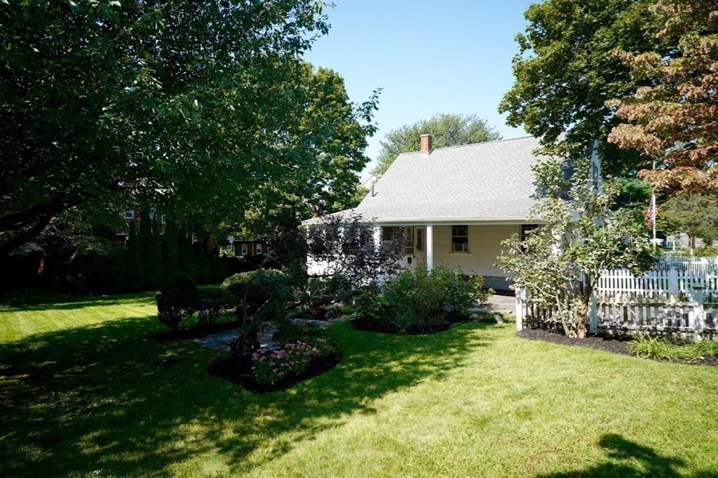 24 Peach Highlands Marblehead, MA 01945 - Photo 32 of 42 a front view of a house with garden