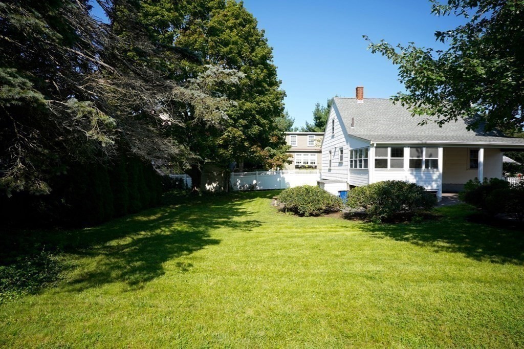 24 Peach Highlands Marblehead, MA 01945 - Photo 34 of 42 a front view of a house with a yard