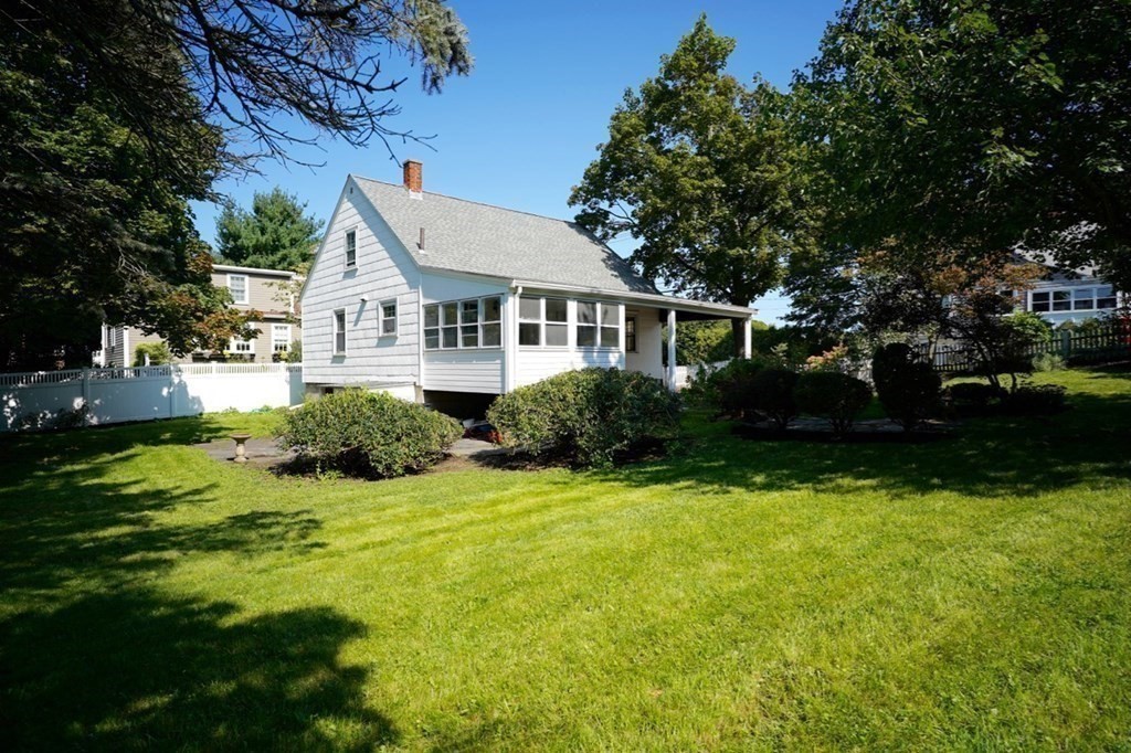 24 Peach Highlands Marblehead, MA 01945 - Photo 35 of 42 a front view of house with yard and green space