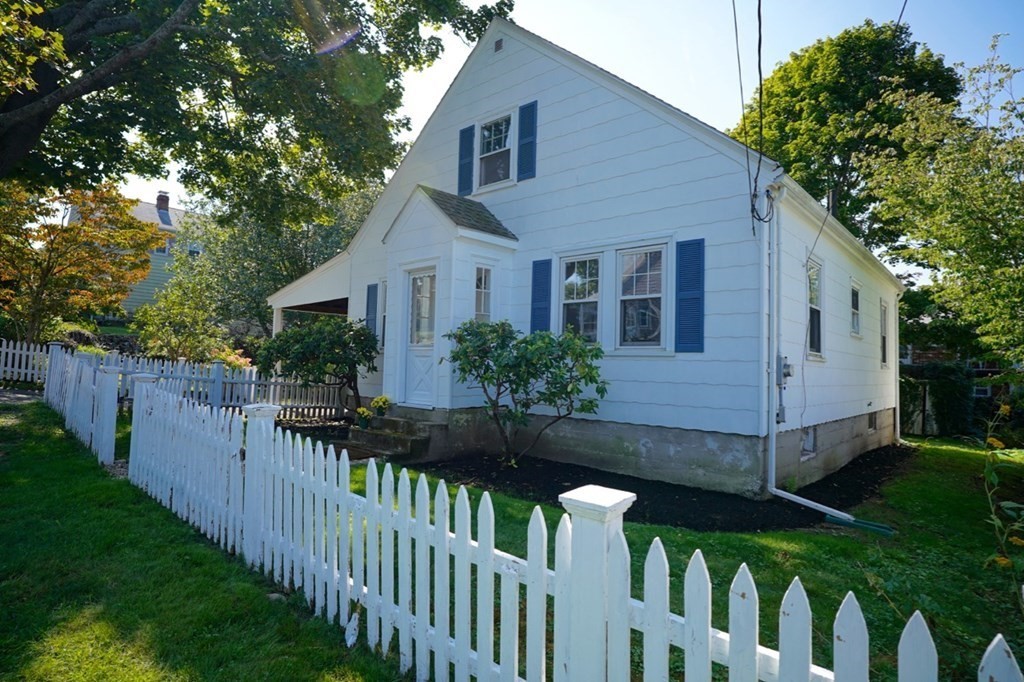 24 Peach Highlands Marblehead, MA 01945 - Photo 4 of 42 a view of a house with wooden fence