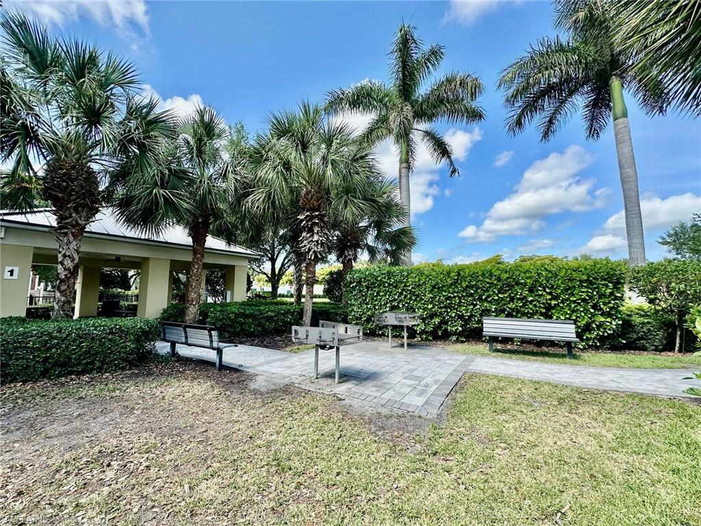 2196 Dragonfruit Way Naples, FL 34120 - Photo 33 of 50 a view of outdoor space yard and porch