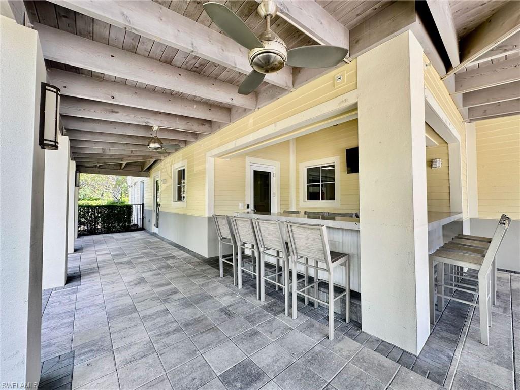 2196 Dragonfruit Way Naples, FL 34120 - Photo 34 of 50 a view of a dinning room with furniture