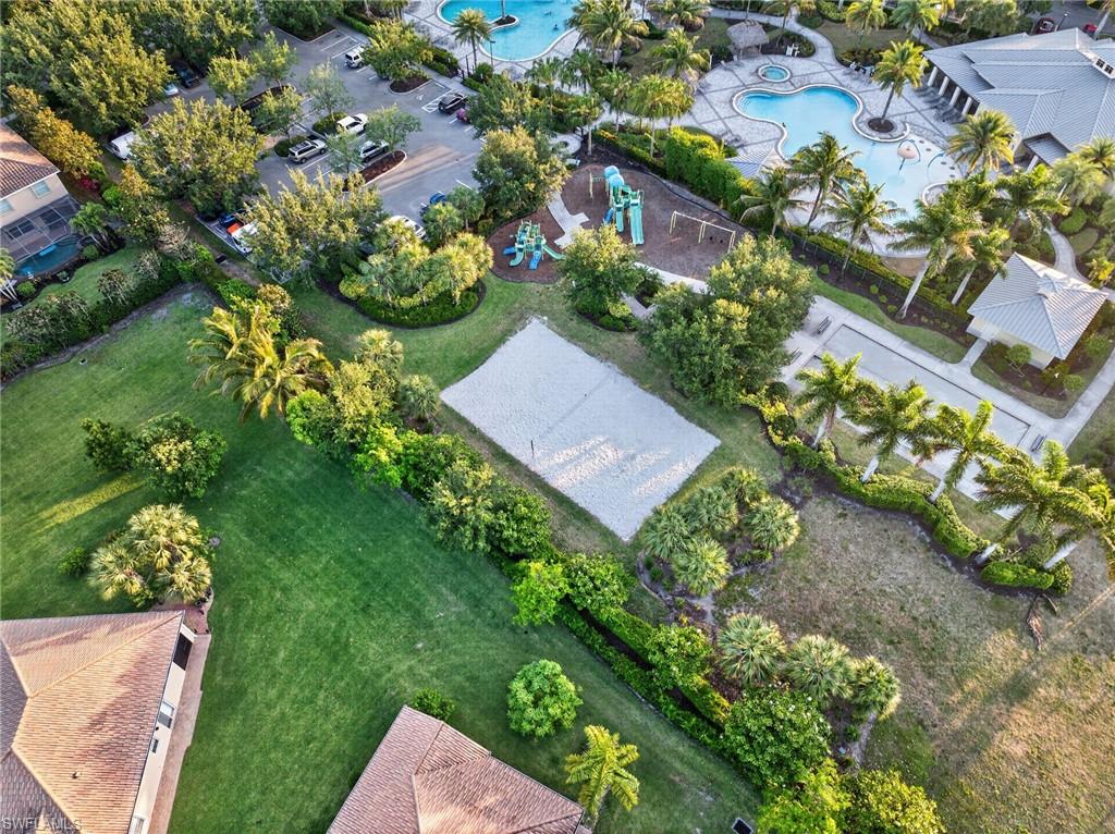 2196 Dragonfruit Way Naples, FL 34120 - Photo 42 of 50 an aerial view of a house with a yard