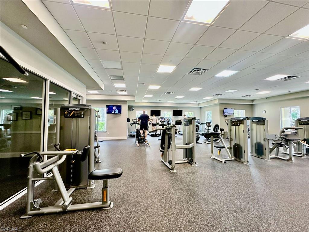 2196 Dragonfruit Way Naples, FL 34120 - Photo 50 of 50 a view of a room with gym equipment