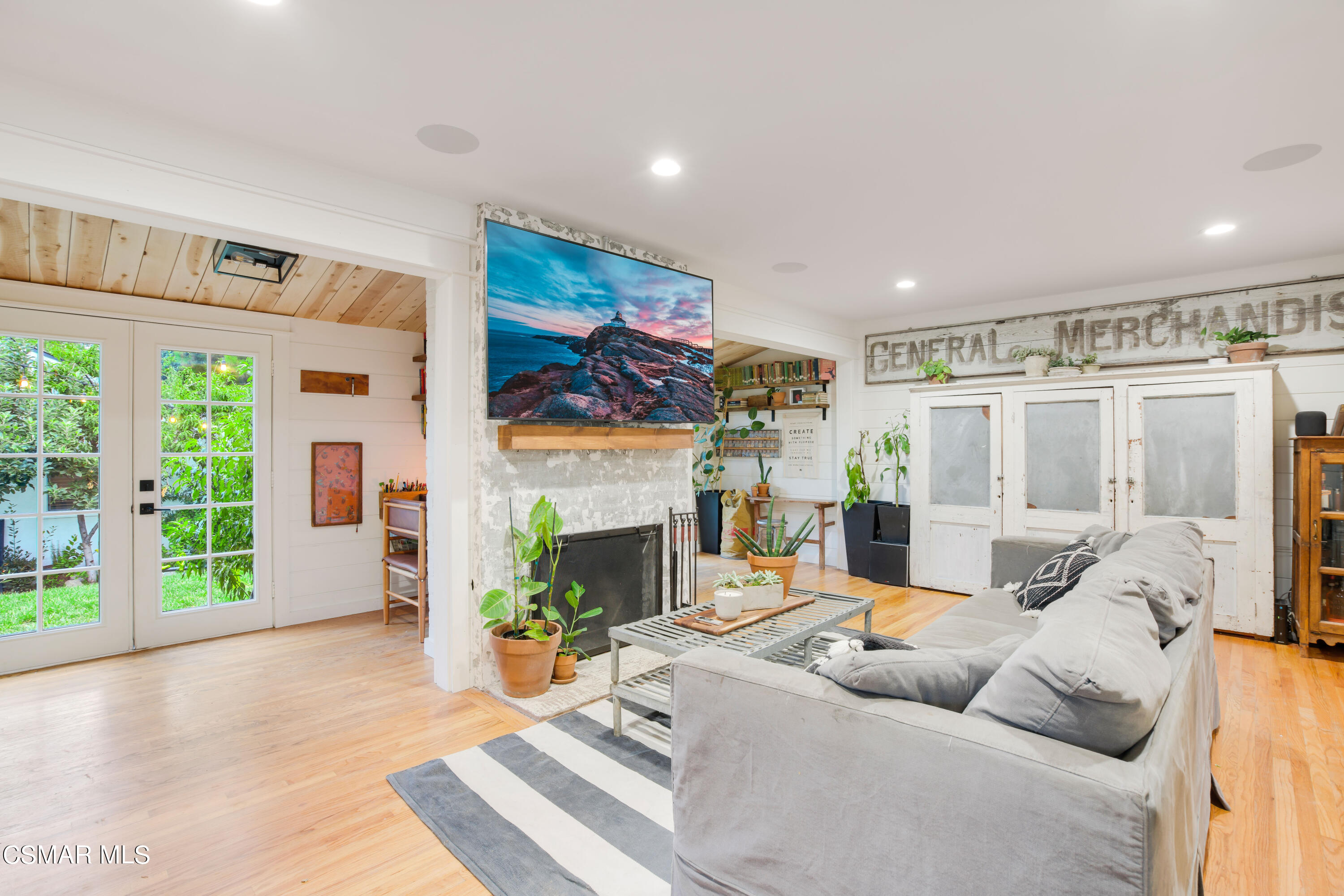 6552 Comanche Avenue Winnetka, CA 91306 - Photo 5 of 20 a living room with furniture and a fireplace