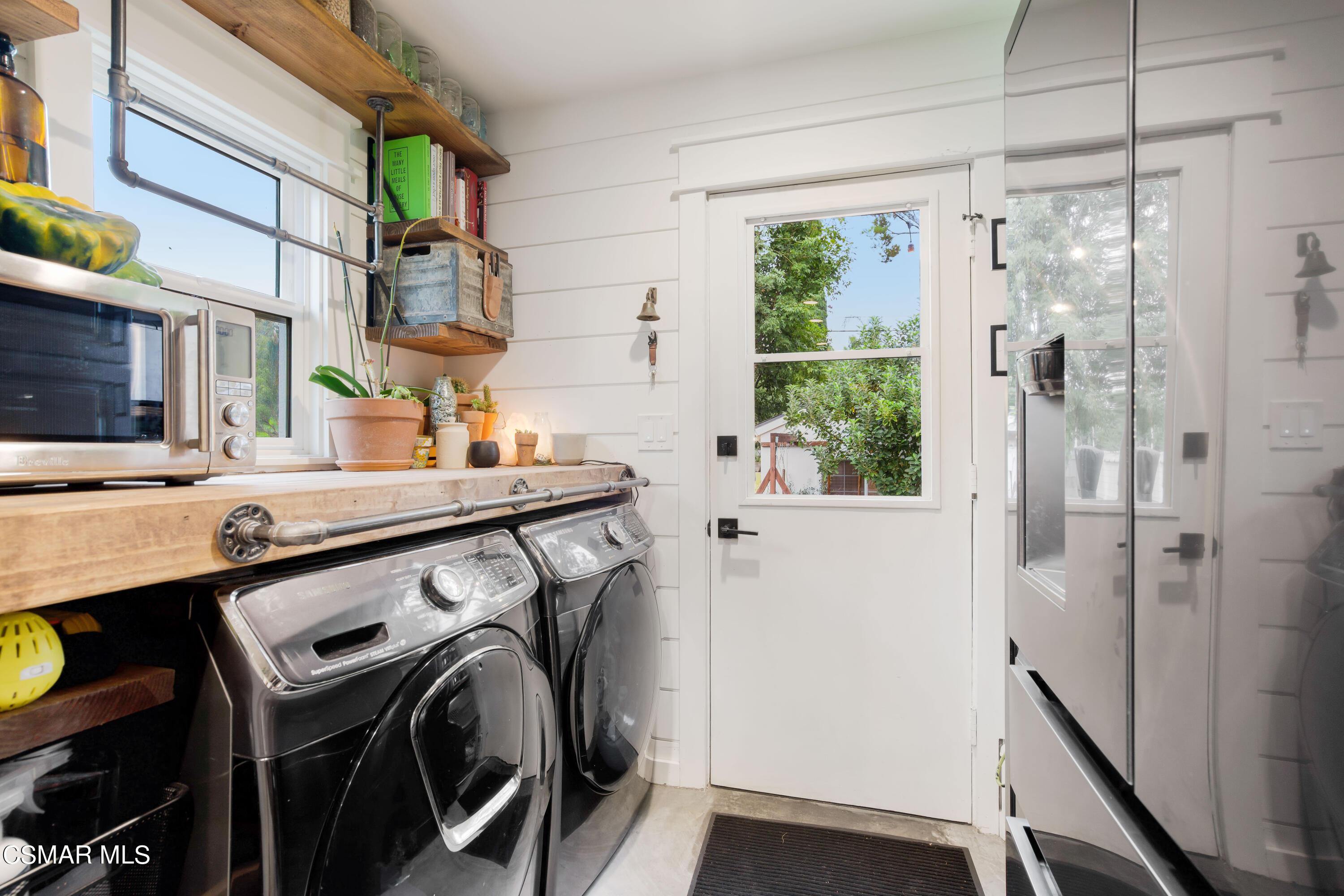 6552 Comanche Avenue Winnetka, CA 91306 - Photo 8 of 20 a utility room with a sink dryer and washer
