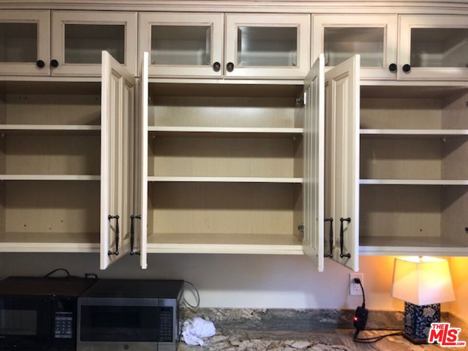 1927 Butler Avenue Los Angeles, CA 90025 - Photo 13 of 19 a room with furniture and a window