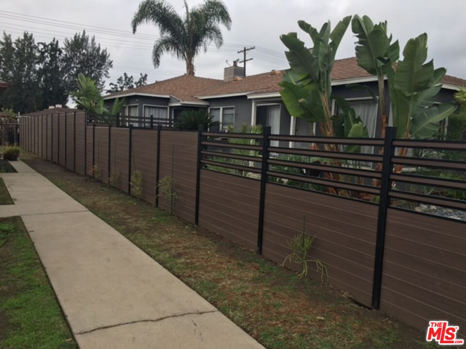 1927 Butler Avenue Los Angeles, CA 90025 - Photo 15 of 19 a front view of a house with a yard