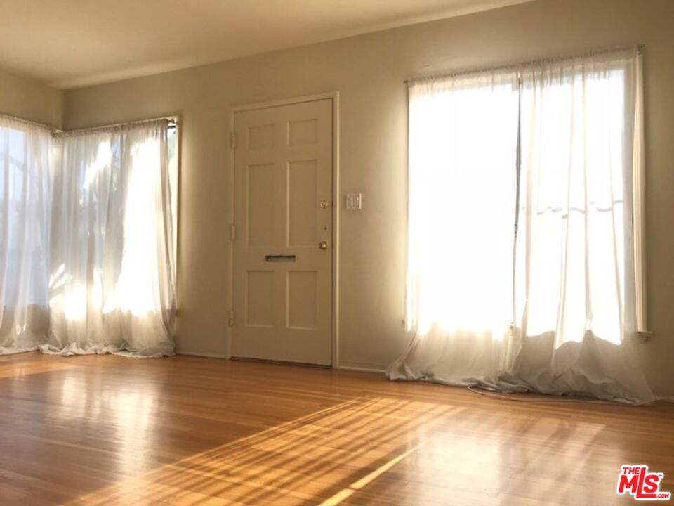 1927 Butler Avenue Los Angeles, CA 90025 - Photo 10 of 19 a view of an empty room and window