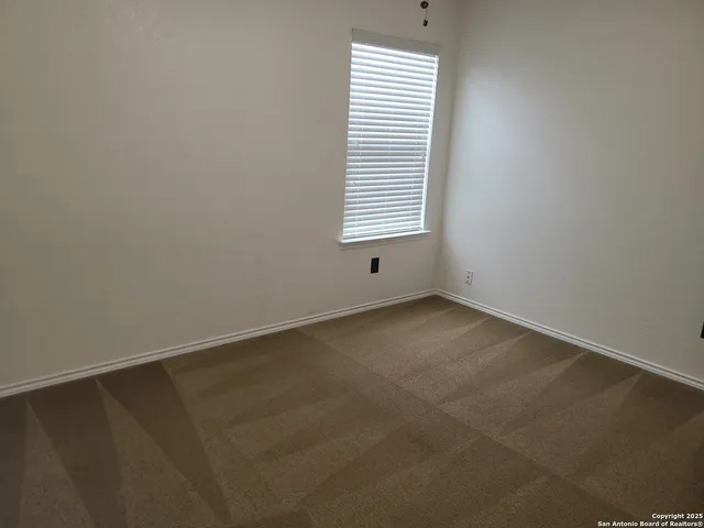 an empty room with an entryway